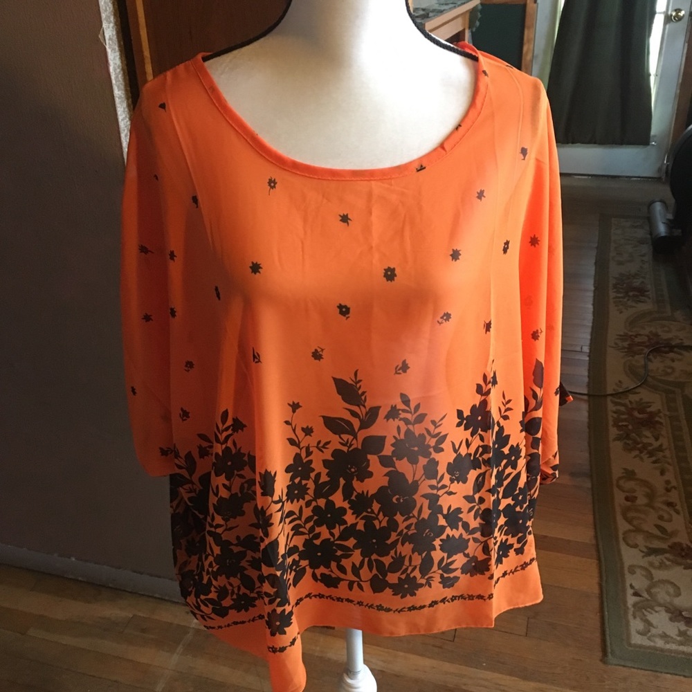 Bright orange blouse